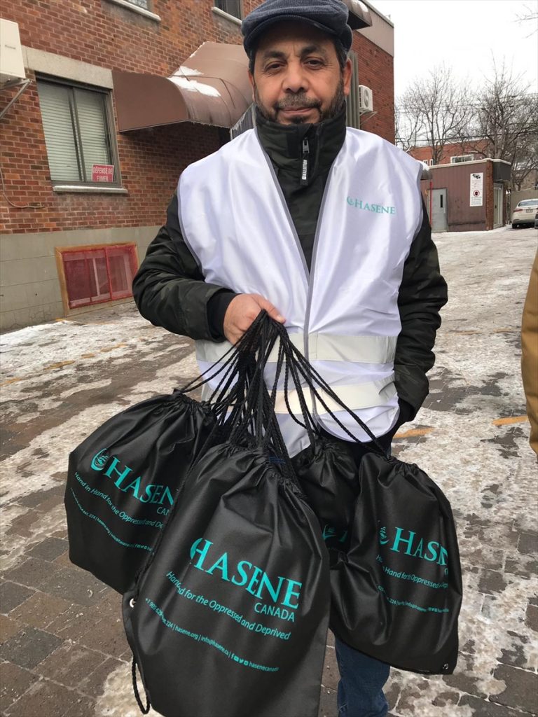 Hasene Derneği, Kanada'da fakirlere kışlık yardım dağıttı.